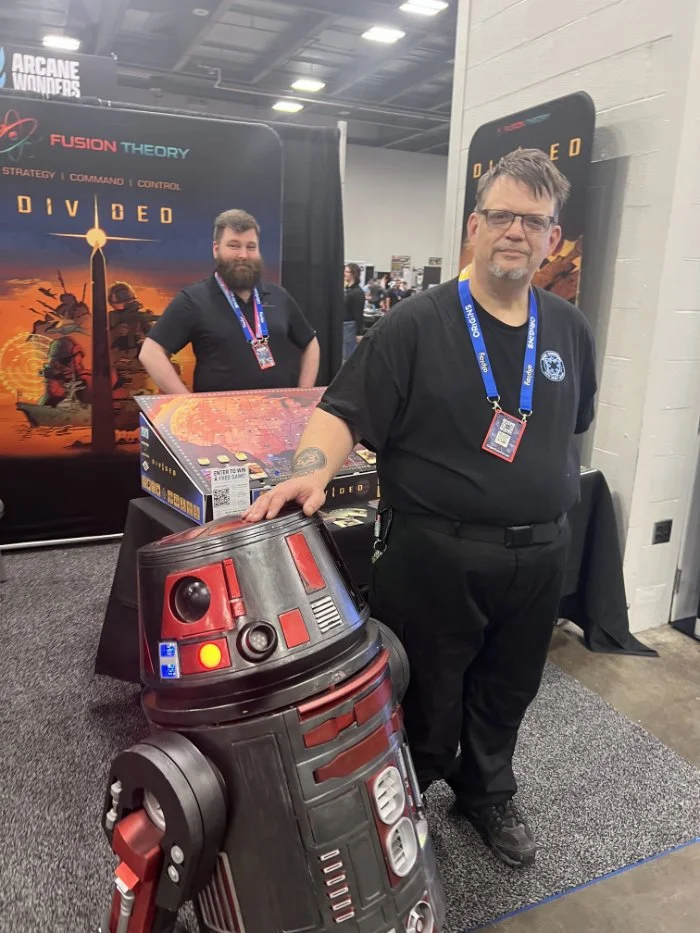 Droid with his maker at the fusion theory booth at Origins