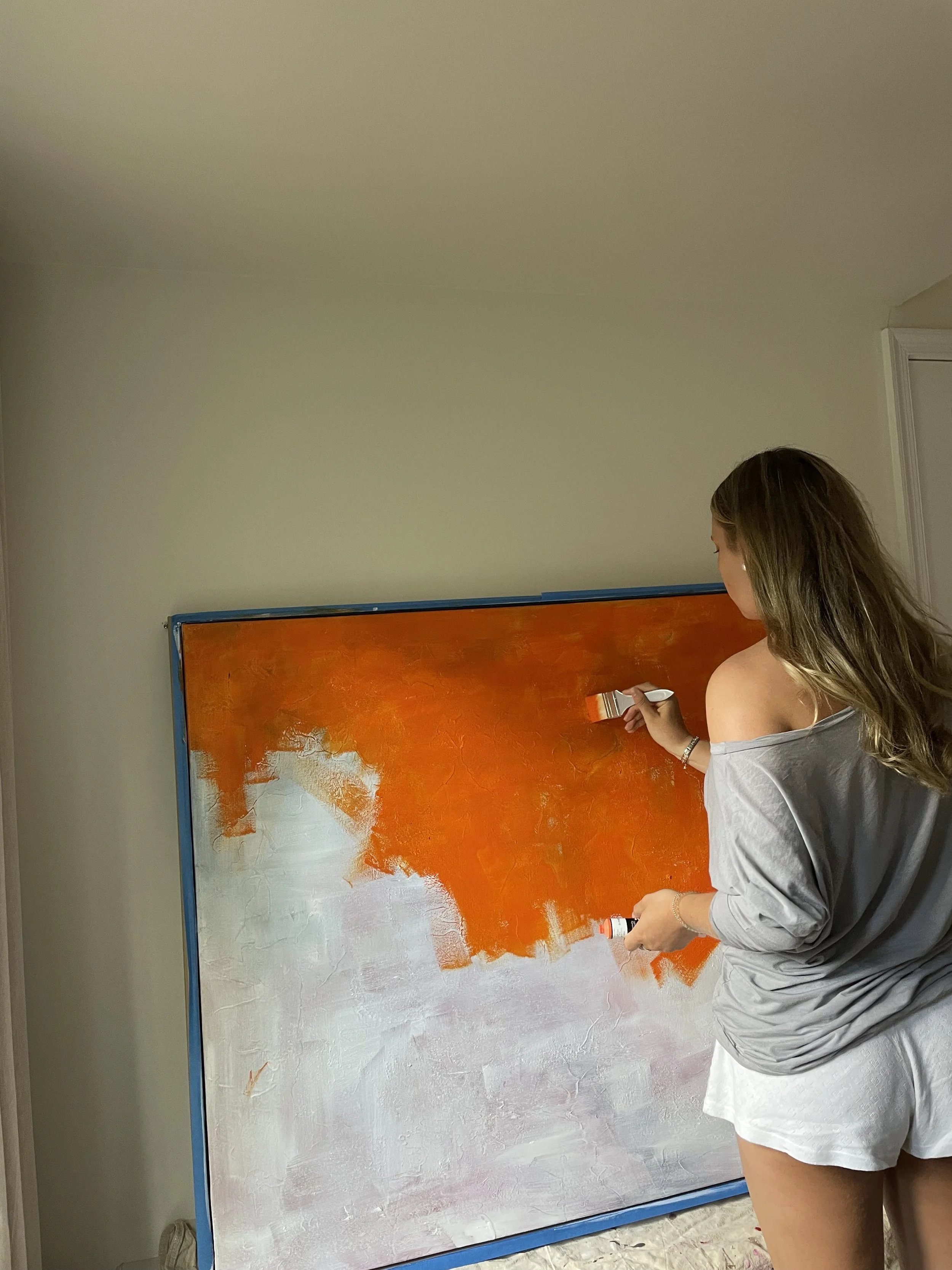 Began with a bold orange underpainting to bring forward the image's warmth.