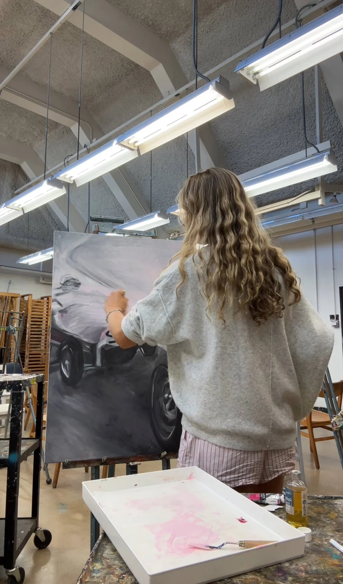 I decided that I wanted a more monochromatic look, so I went over the painting in a light pink glaze.