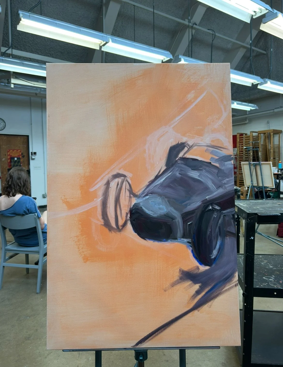 I began with an orange wash to give the painting warm undertones.
