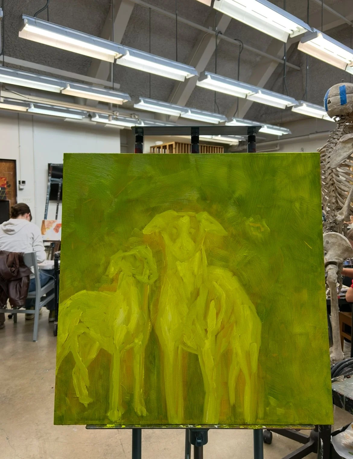 I began to add highlights to the dogs and went over them in a green wash to add more cohesion. 
