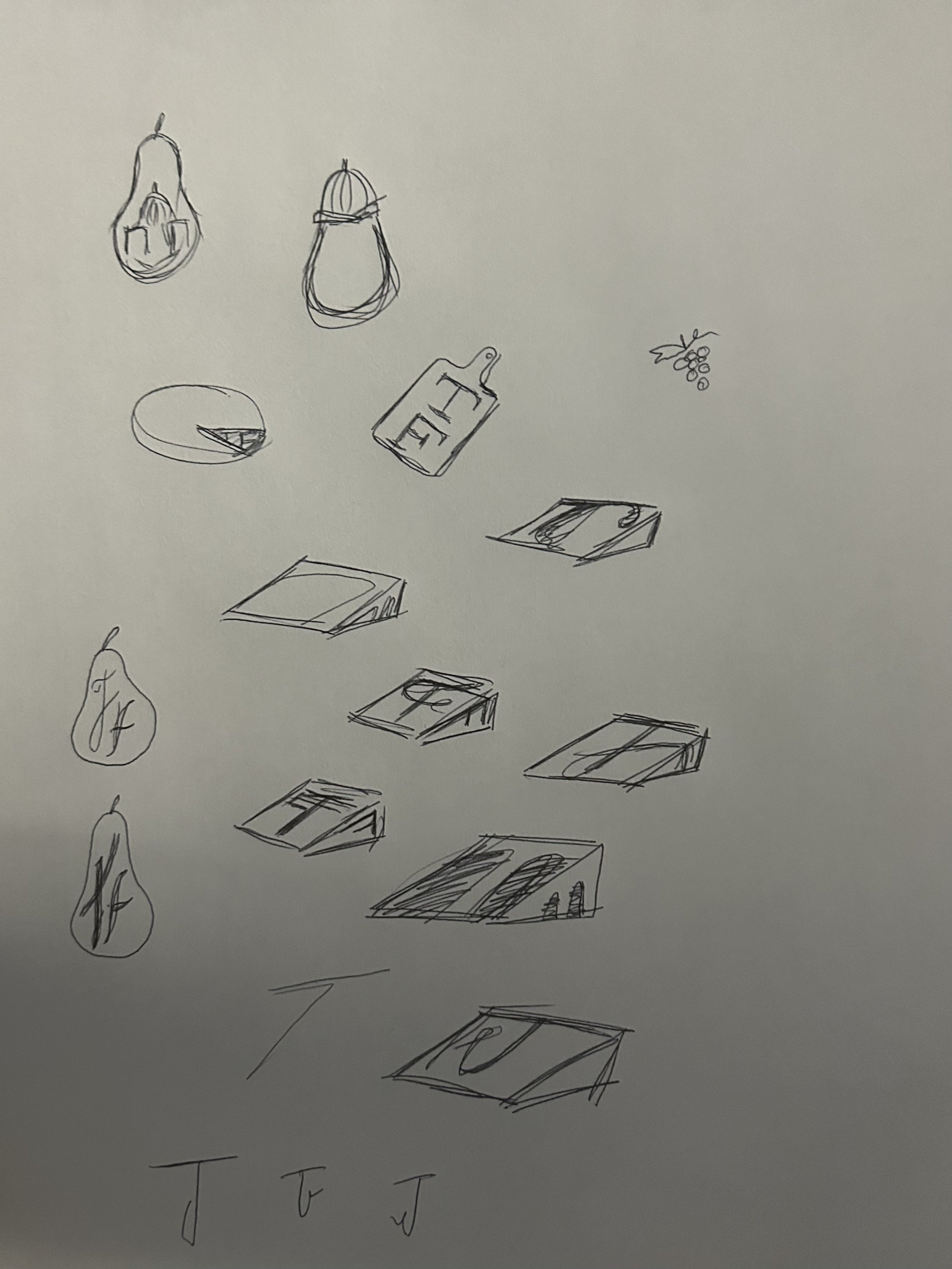 I began to sketch out some ideas incorporating symbols of charcuterie mixed with the business monogram of the T and the F.