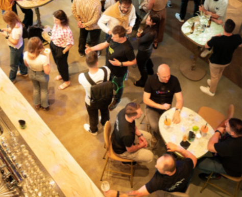 A bird's-eye view of attendees during a break at the InsurTech Conference in London