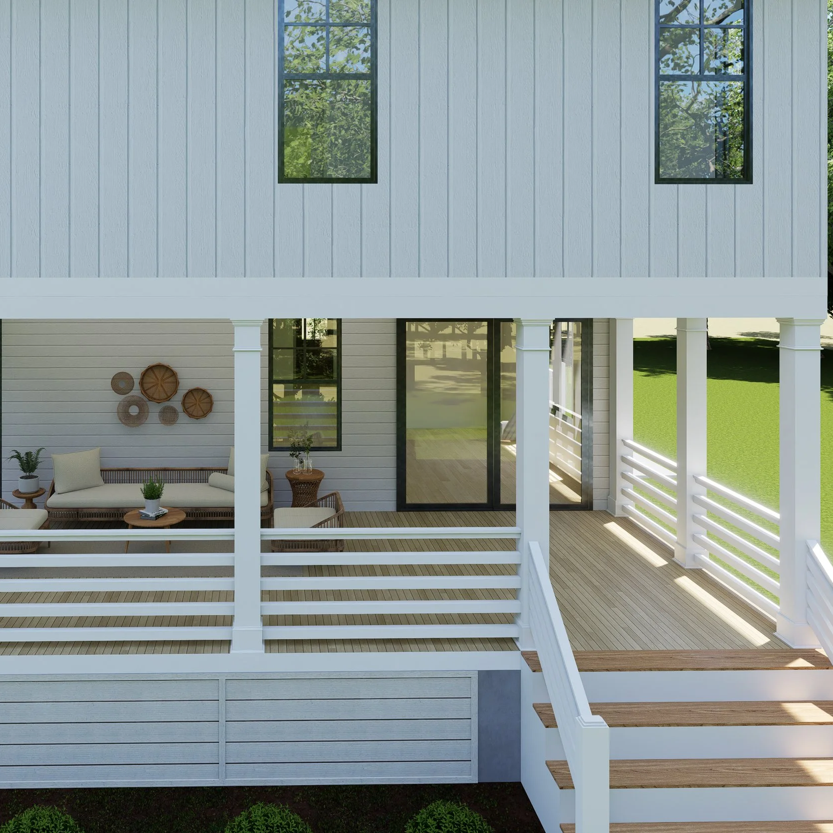 A porch with white railings and stairs, outdoor seating with a sofa and chairs, potted plants, and decorative wall art, overlooking a grassy yard with trees.