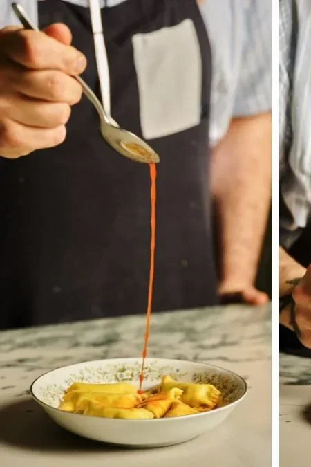 Person pouring spaghetti sauce over a bowl of pasta.