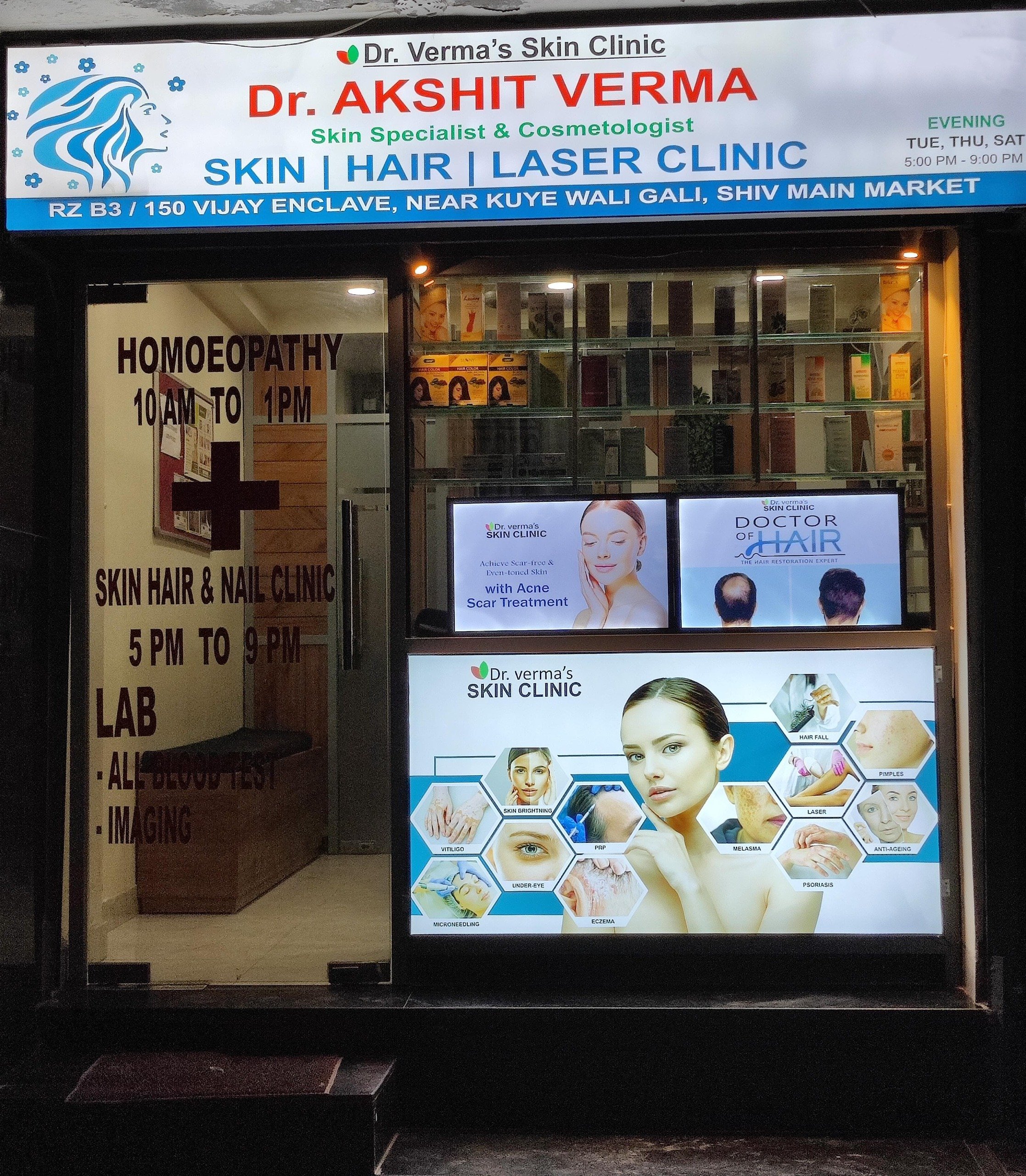 Signboard of Dr. Verma's Skin Clinic with details of services, timings, and advertisements for skin and hair treatments, along with images of skincare procedures.