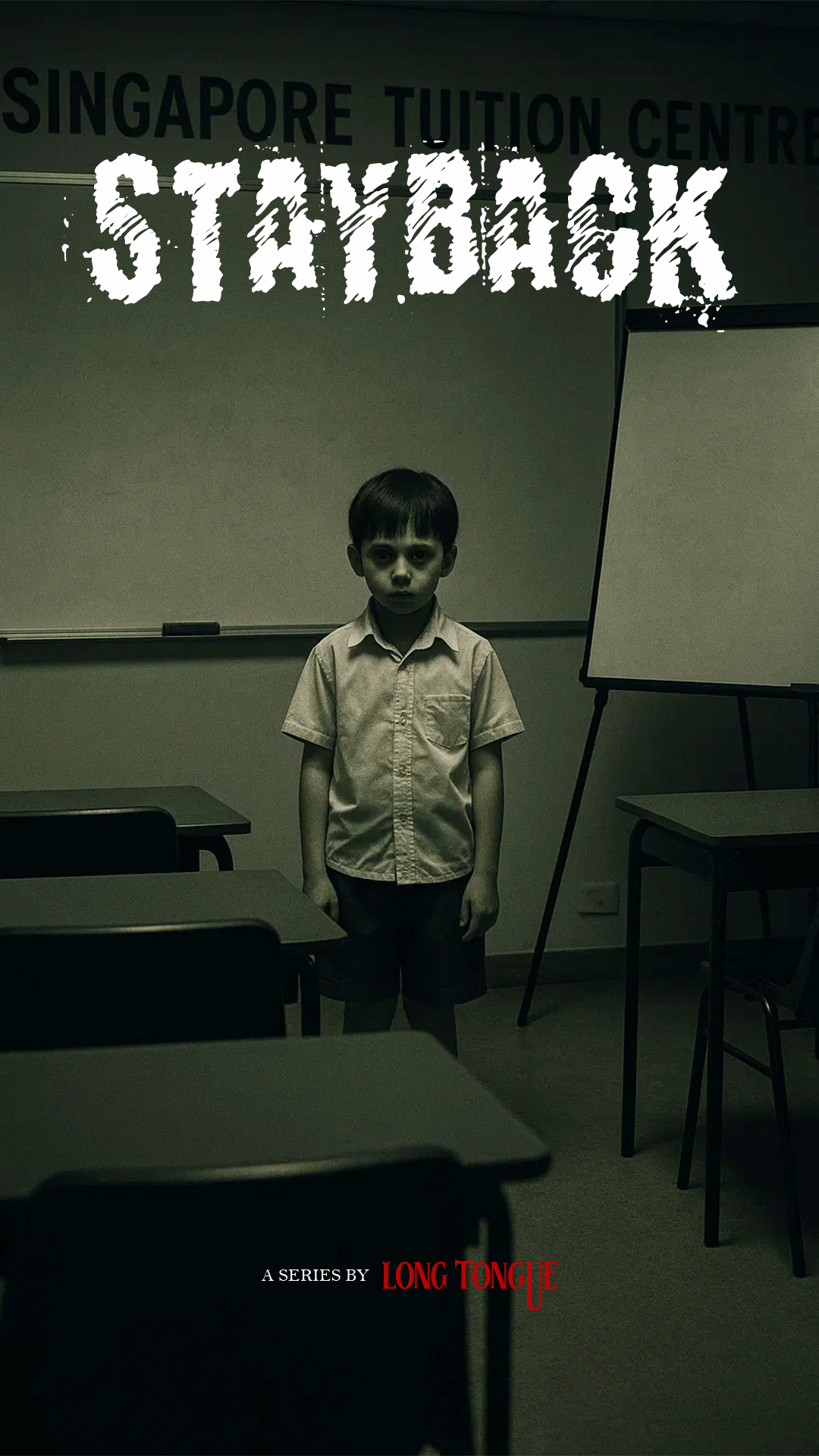 A young boy in a classroom with empty desks and chairs, standing in front of a whiteboard, with the words "STAYBACK" and "A SERIES BY LONG TONGUE" overlaid on the image.