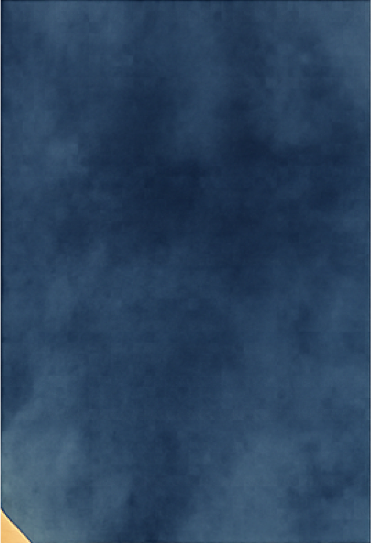 A close-up of a blue textured surface, likely fabric or paper.