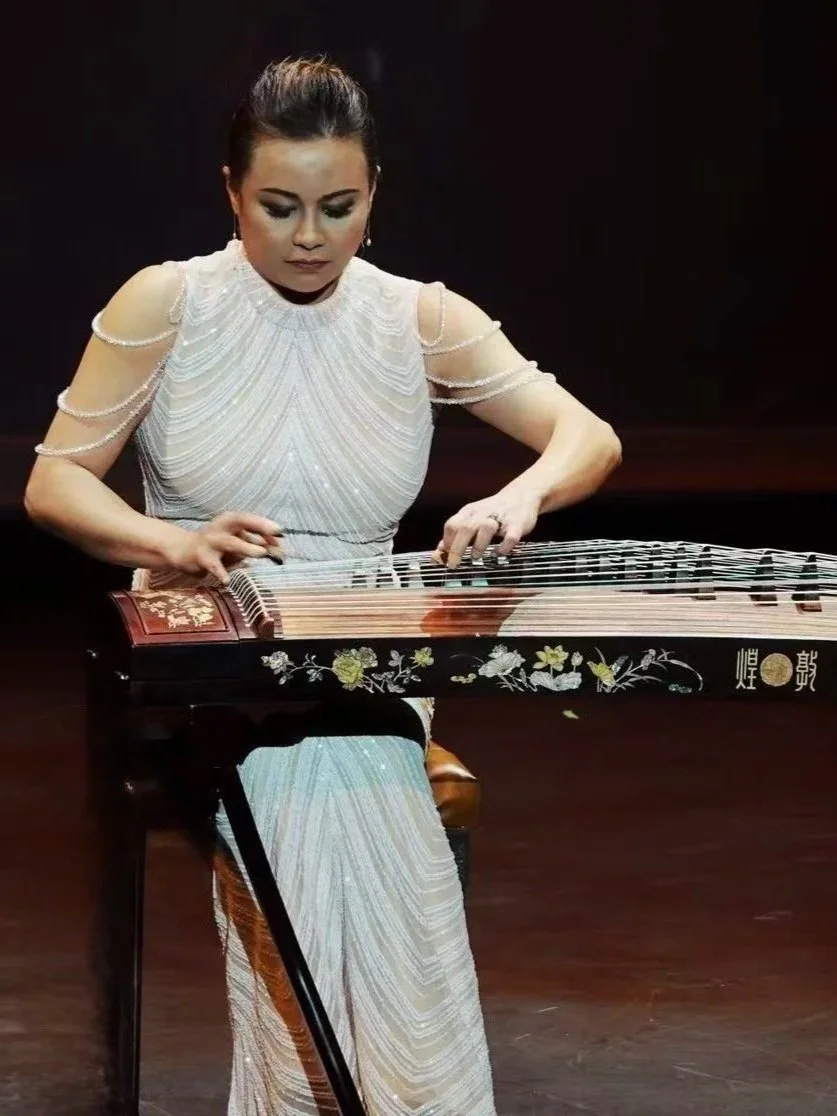 Dallas favorite Guzheng Performer Uko Adams million-dollar guzheng Dunhuang Yun Dallas performing crouching tiger.jpg