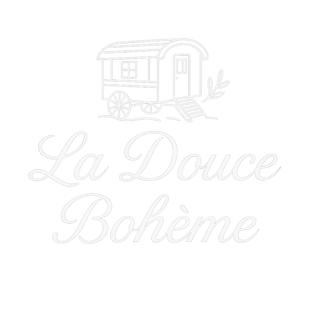 White line drawing of a small wooden caravan with steps leading to the door, set against a black background, with the words "La Douce Bohème" written in elegant cursive below.