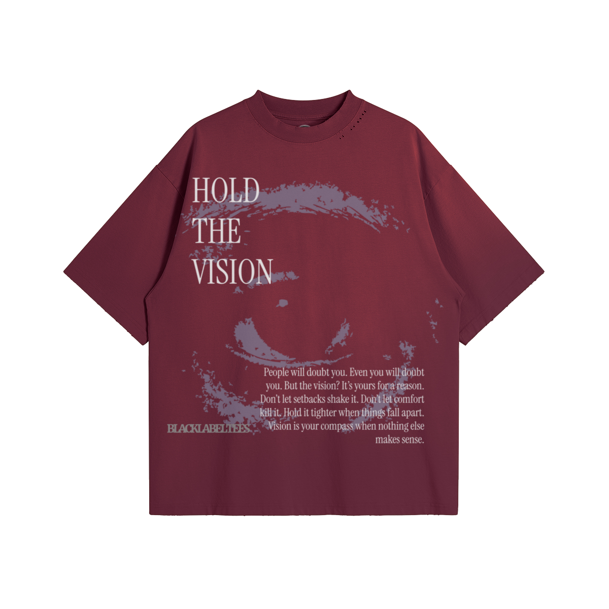 Maroon T-shirt with white printed text and face graphic. Text includes 'HOLD THE VISION' at the top, a large outlined face graphic in the background, and additional text below: 'People will doubt you. Even you will doubt you. But the vision? It's yours for a reason. Don't let setbacks shake it. Don't let comfort kill it. Hold it tighter when things fall apart. Vision is your compass when nothing else makes sense.' The brand name 'BLACKLABELTIES' is at the bottom left.