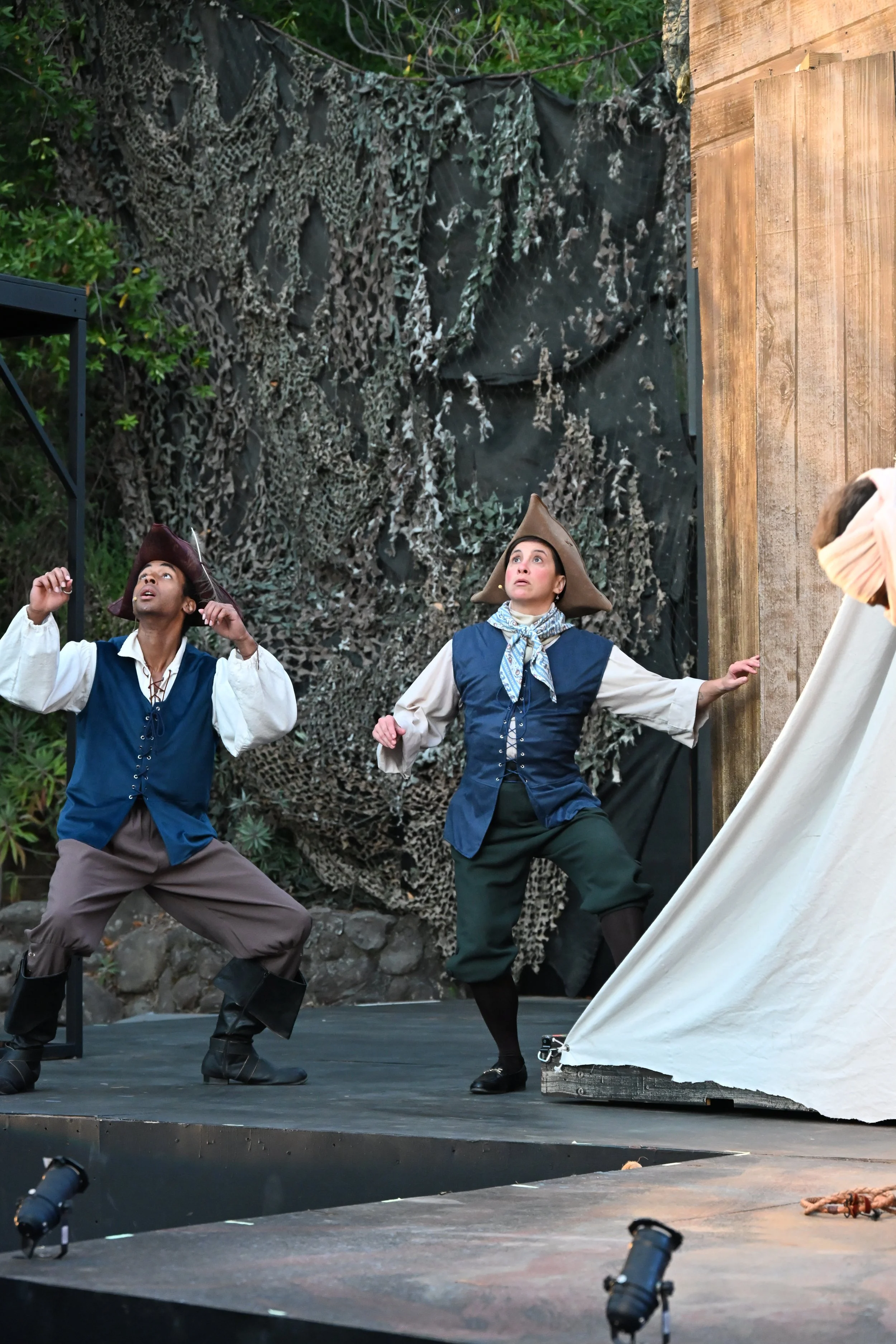Iyanu Olukotun performing as a Mariner alongside another sailor during the storm scene in The Tempest at Marin Shakespeare Company, photographed by Jay Yamada