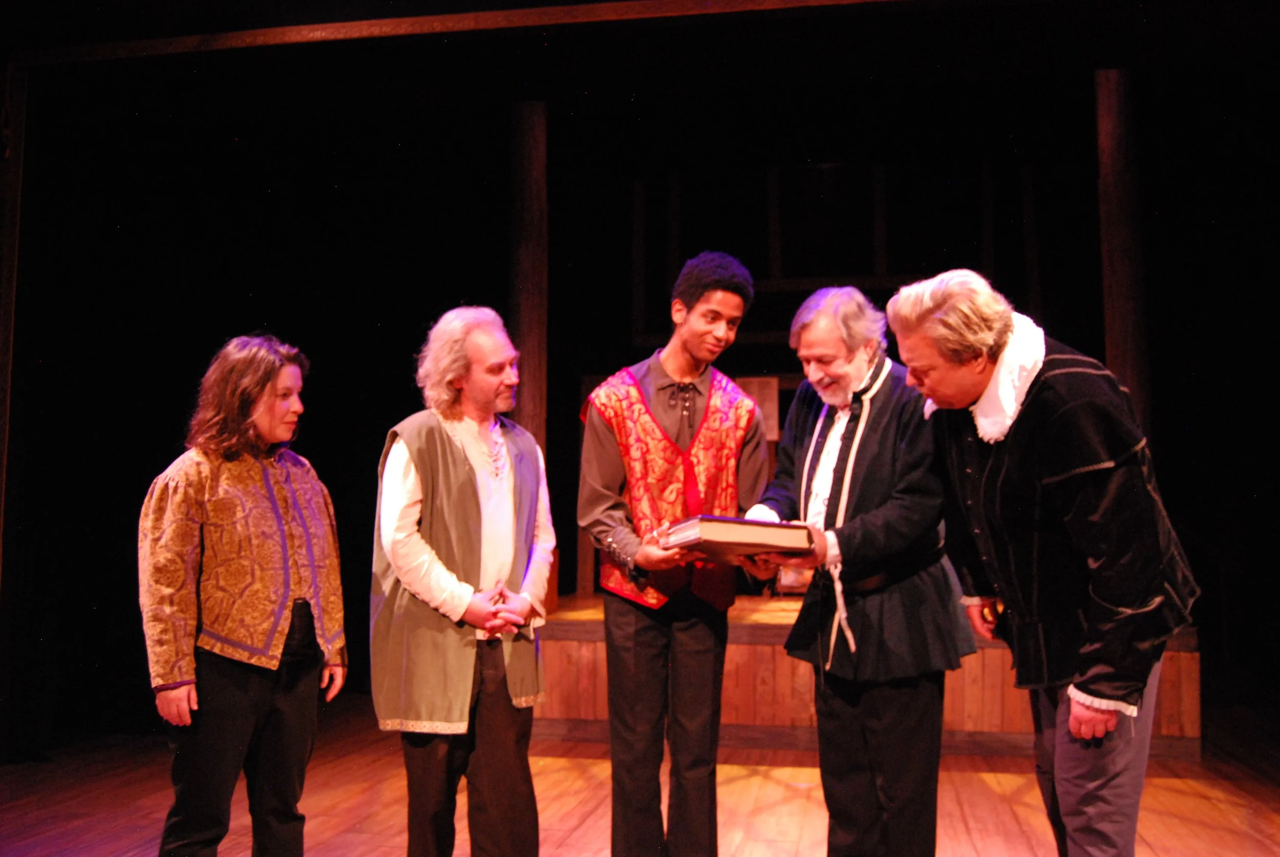 Iyanu Olukotun as Isaac Jaggard with the ensemble in a scene from The Book of Will, photographed by Elaine Yee