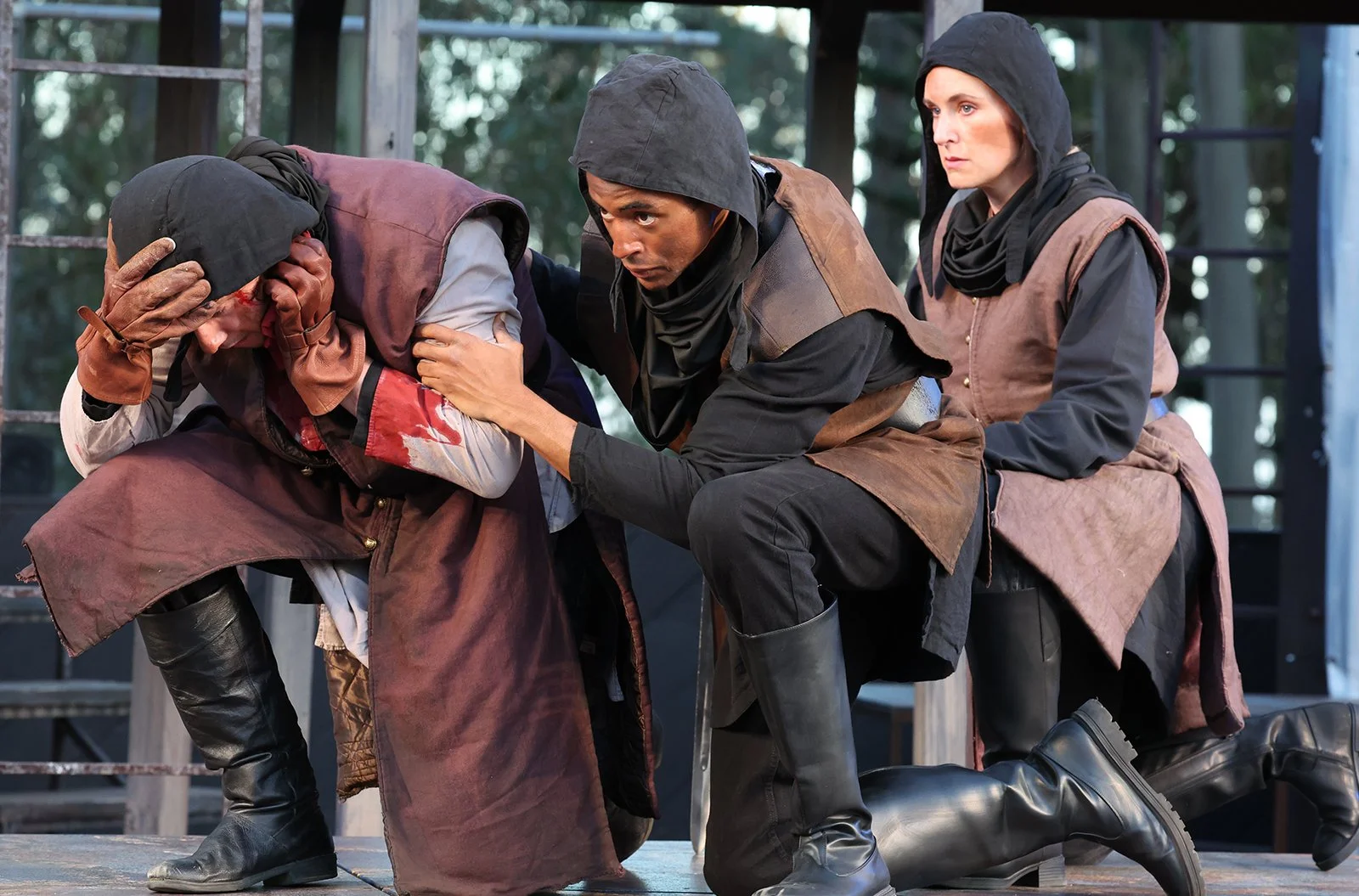 Chris Cherin as Captain with Iyanu Olukotun and Charlotte Boyce Munson as soldiers in Macbeth, photographed by Shmuel Thaler
