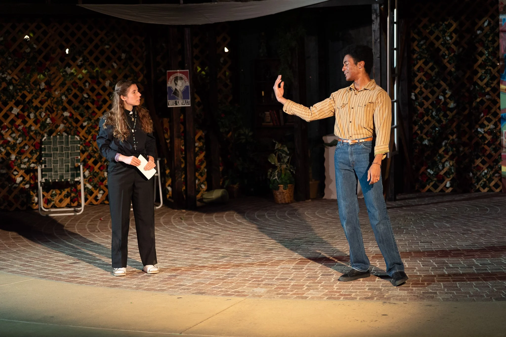 Iyanu Olukotun as Romeo in a scene with Friar Laurence in Romeo and Juliet, photographed by Frank Chen