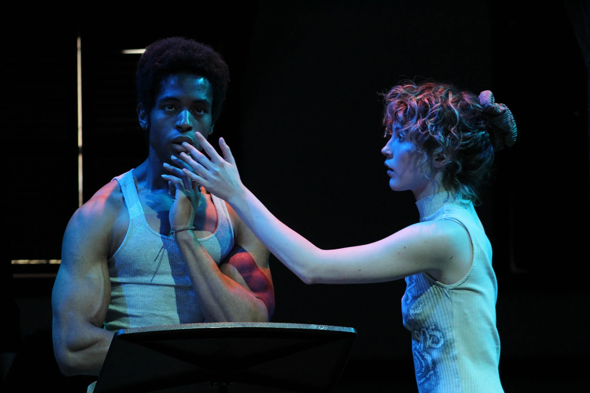 Iyanu Olukotun as Narcissus in a square composition scene with Echo, photographed by Emma Brown