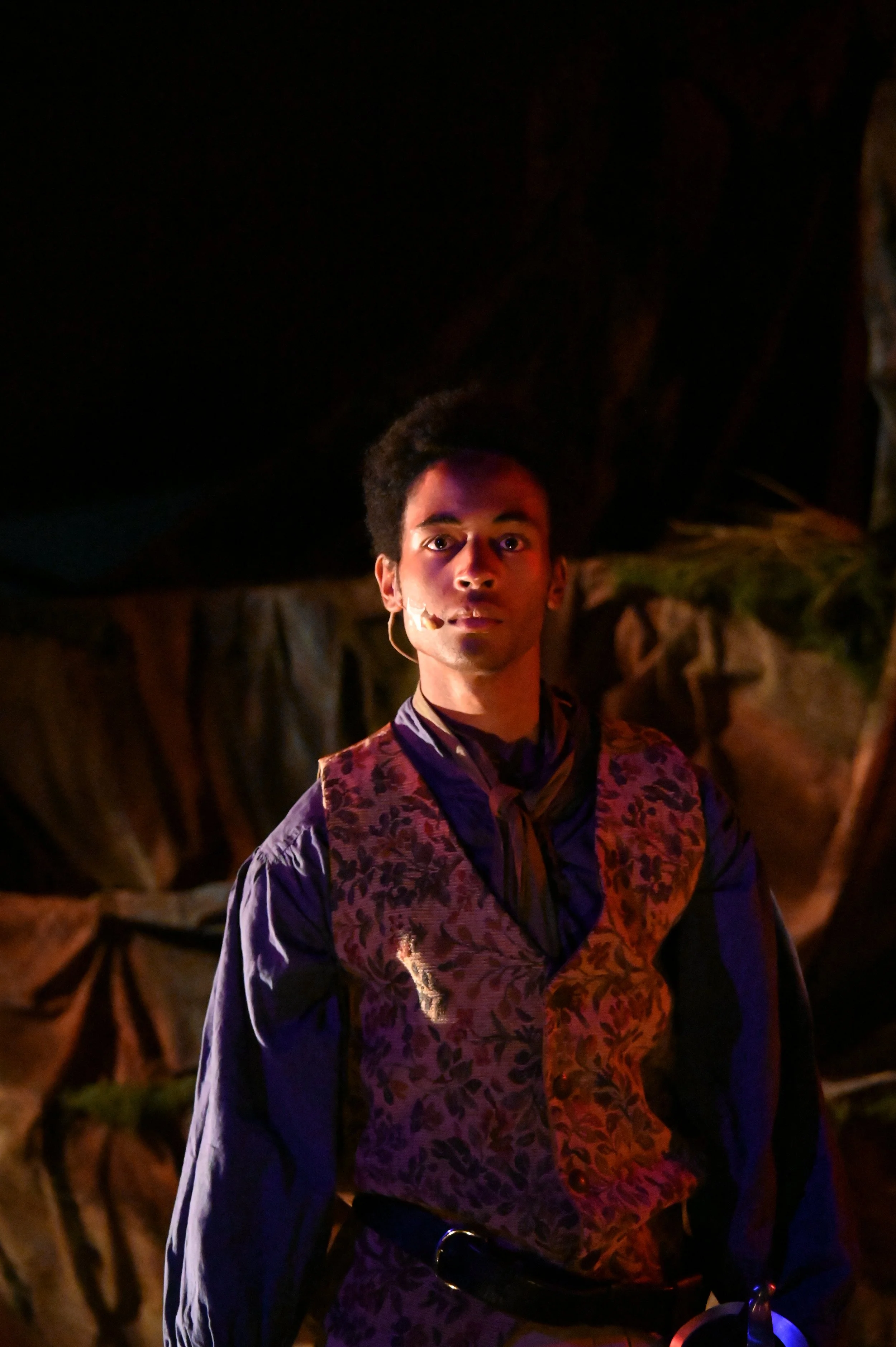 Iyanu Olukotun as Adrian in an intense dramatic moment in The Tempest at Marin Shakespeare Company, photographed by Jay Yamada