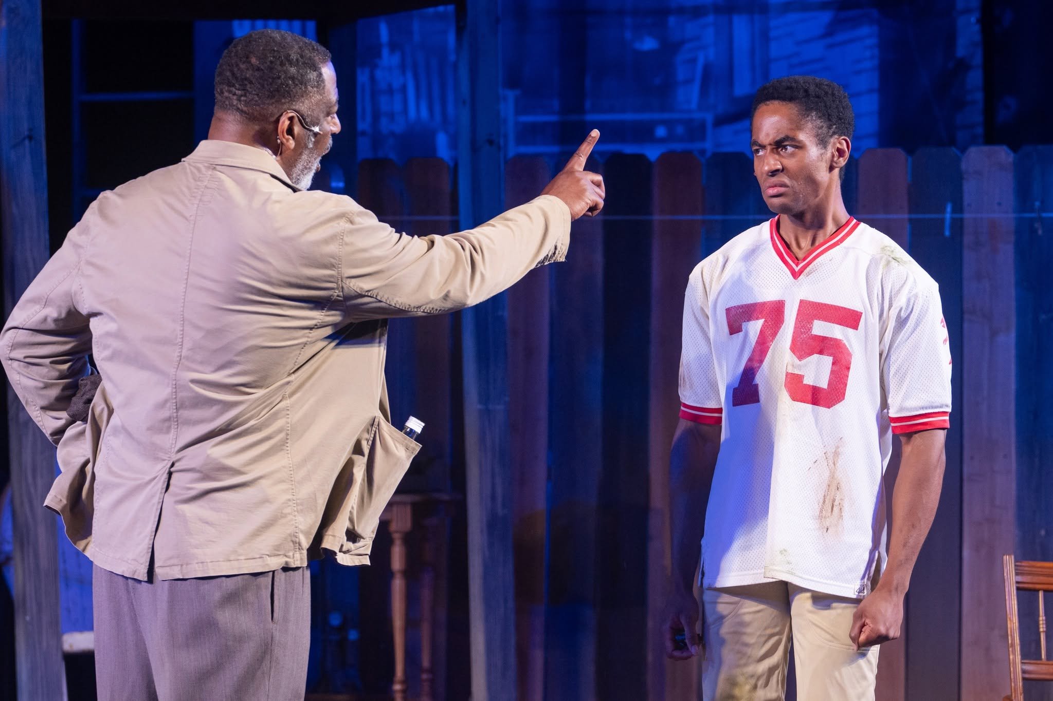 Derrick Lee Weeden as Troy with Iyanu Olukotun as Cory in Fences, photographed by Davis Banta