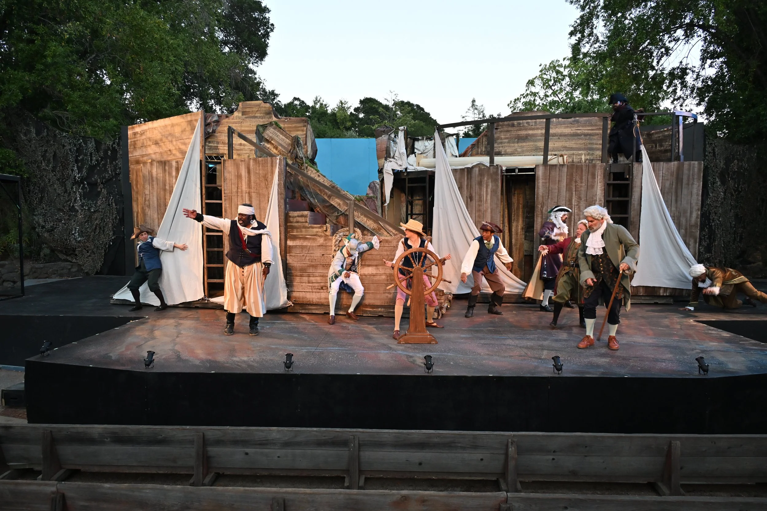 Iyanu Olukotun as Mariner in a large ensemble storm scene with the royal court and sailors in The Tempest at Marin Shakespeare Company, photographed by Jay Yamada