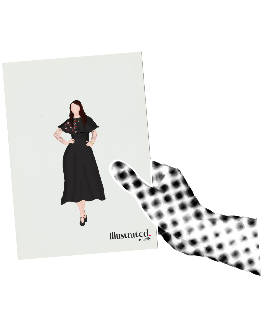 A person holding a magazine featuring a woman in a black dress with floral embroidery on the top, standing with her hands on her hips, against a plain white background.
