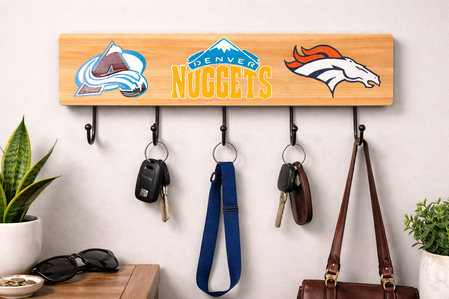 Denver sports on wall.png
