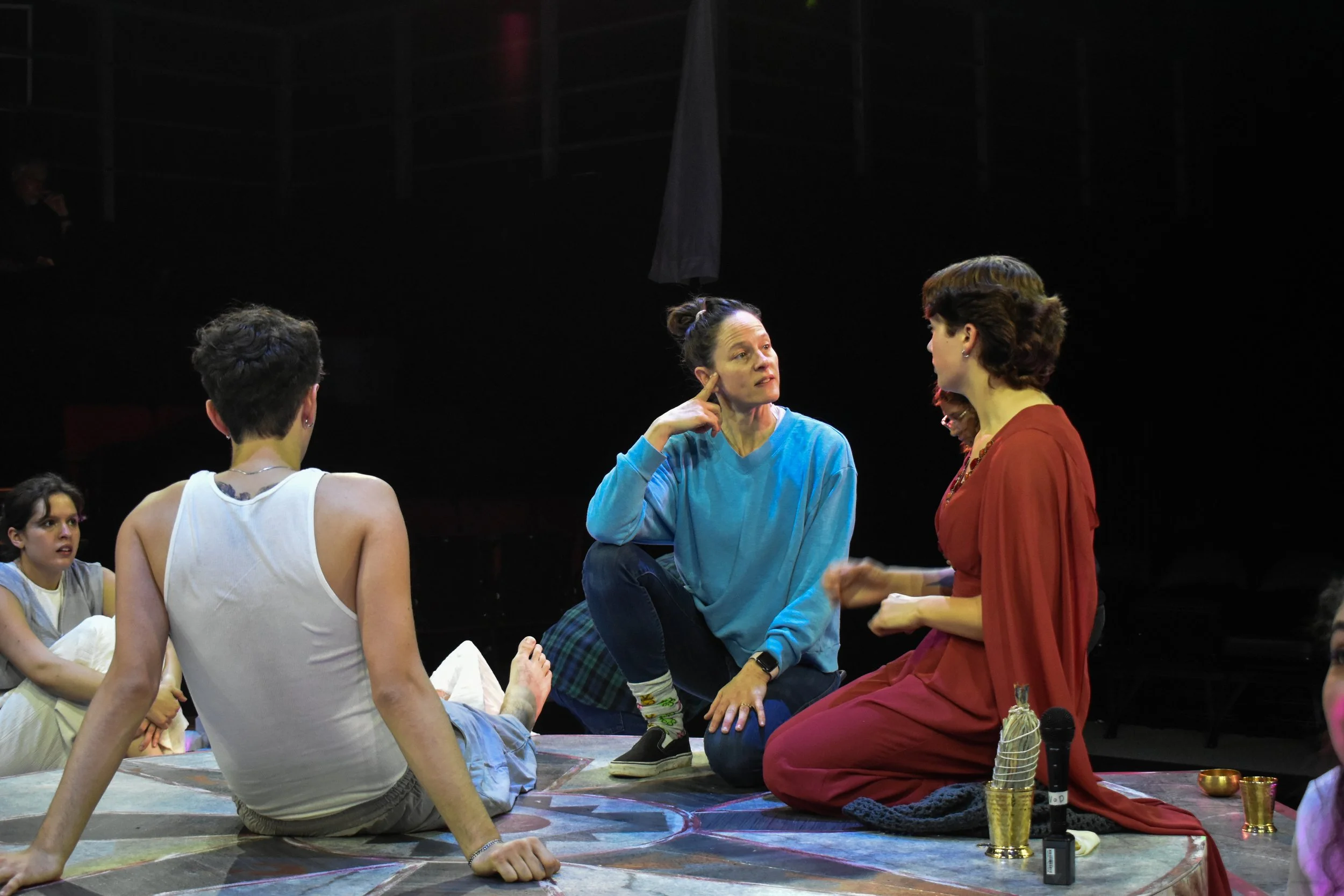 Summer 2025 - Classes take a pause for summer break, but the dramaturg never rests! I dive deep into various translations of 'Antigone'—including Anne Carson's, which our production used—and created a glossary (shown above: dir. Jenny Lamb speaking w