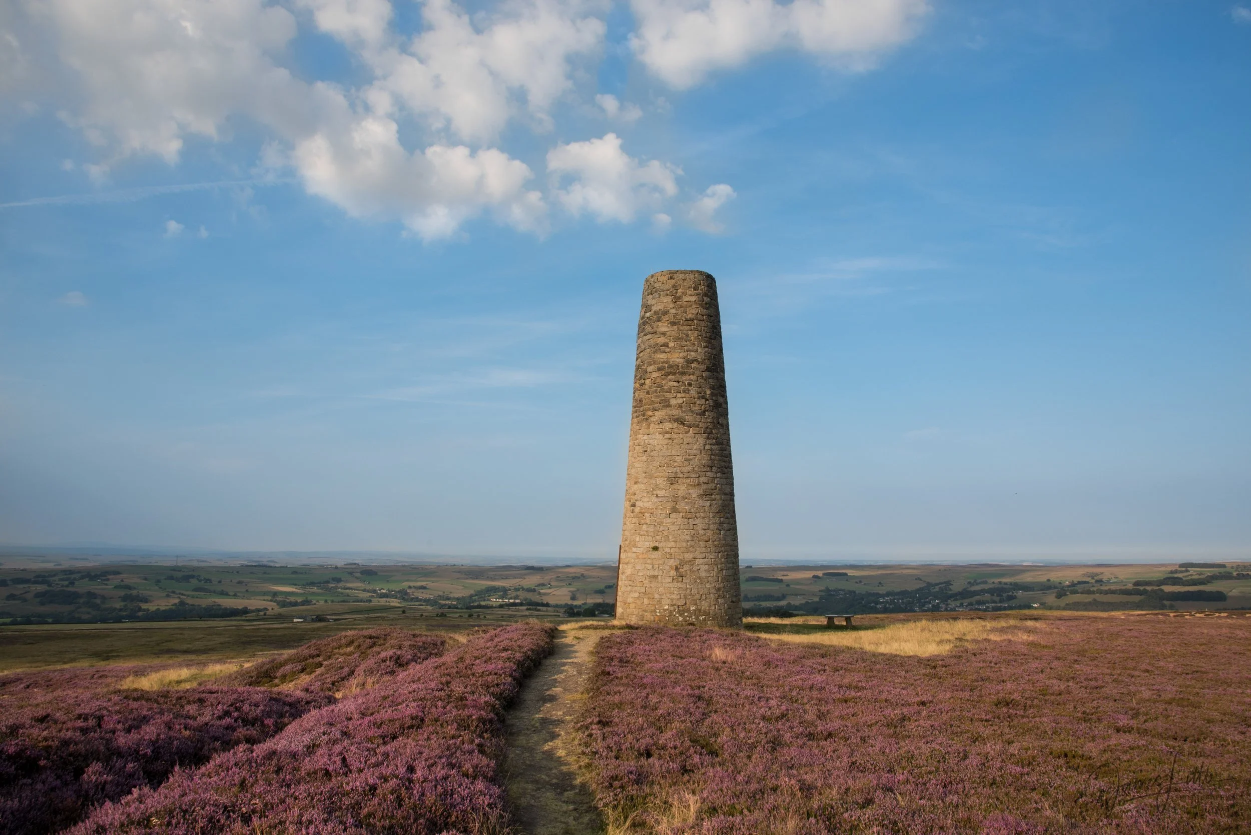 Allendale Chimney on a hot summers day high up on the fell at Dryburn Moor. 