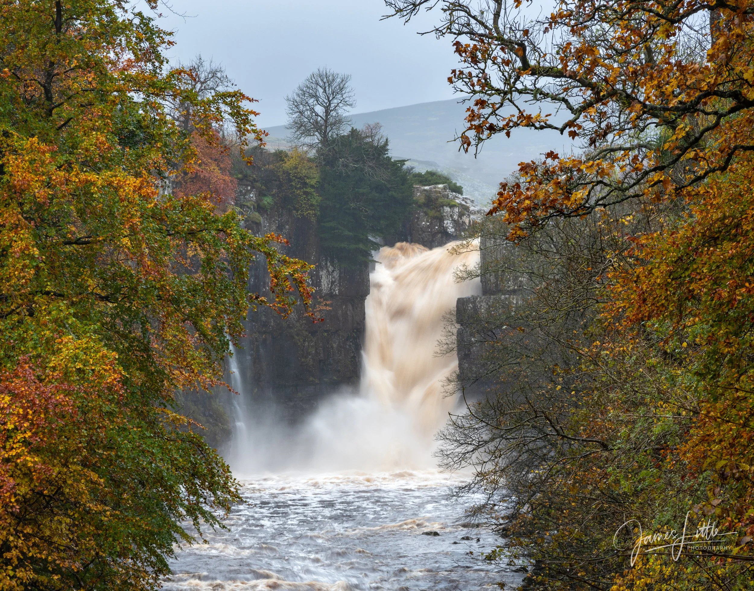 High Force waterfall in autumn from the public footpath