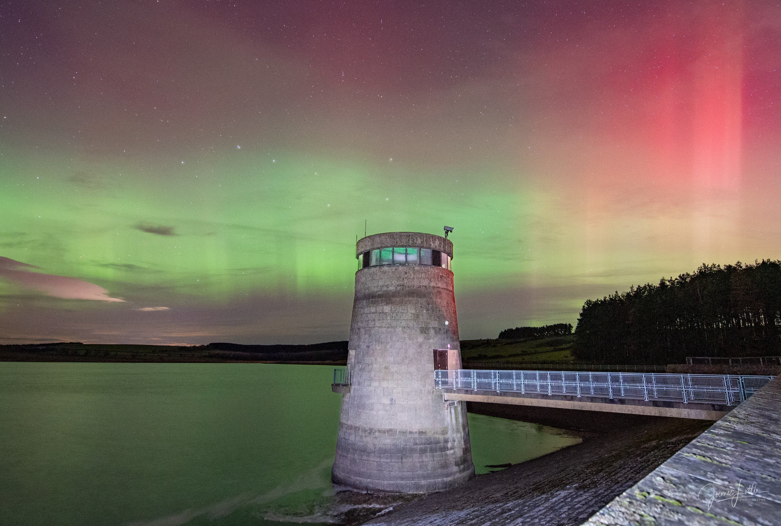 Derwent Reservoir at night with the northern lights