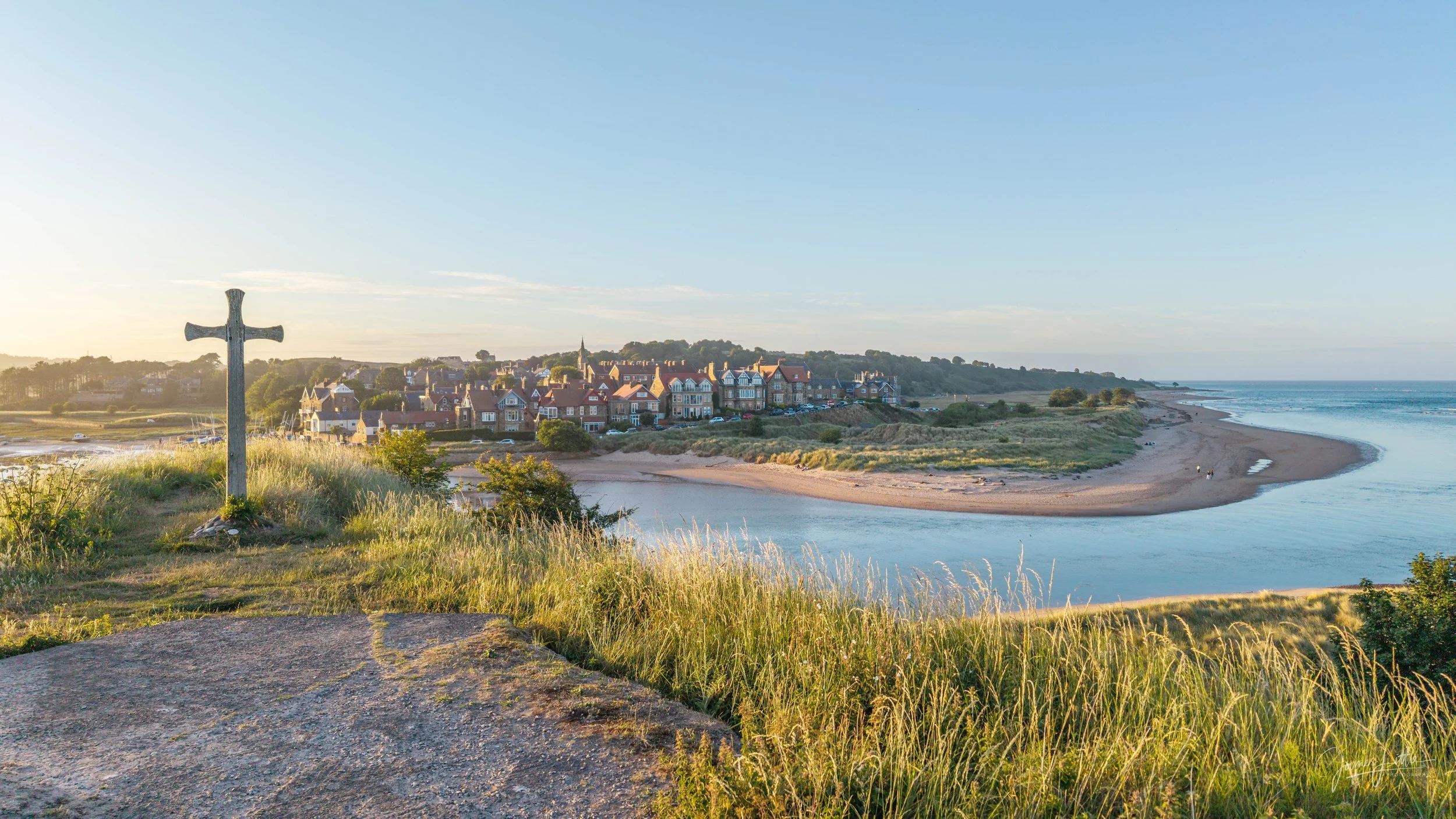 Almouth from the cross in the dunes on the other side of the river Aln