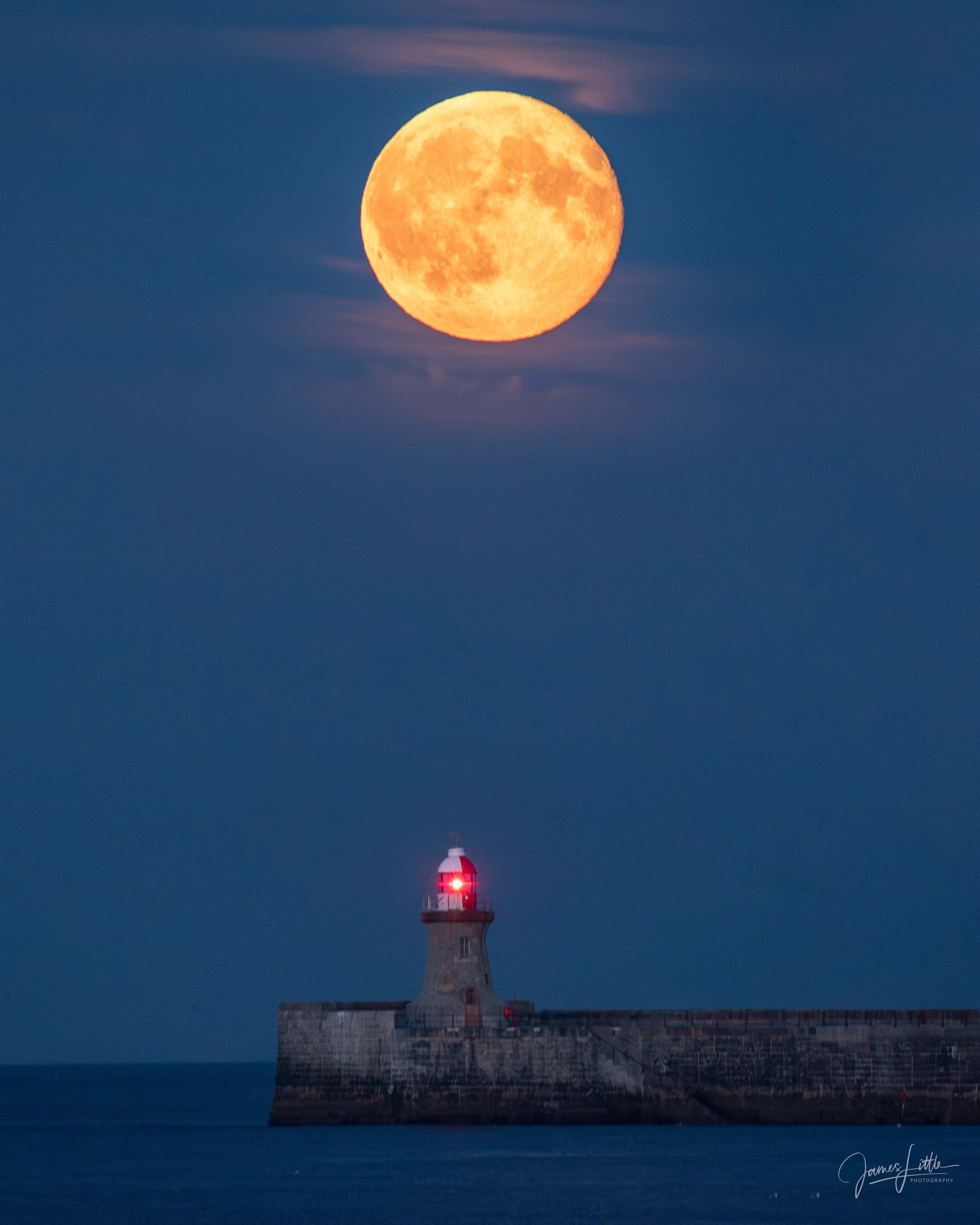 South Shields lighthouse during a full moon