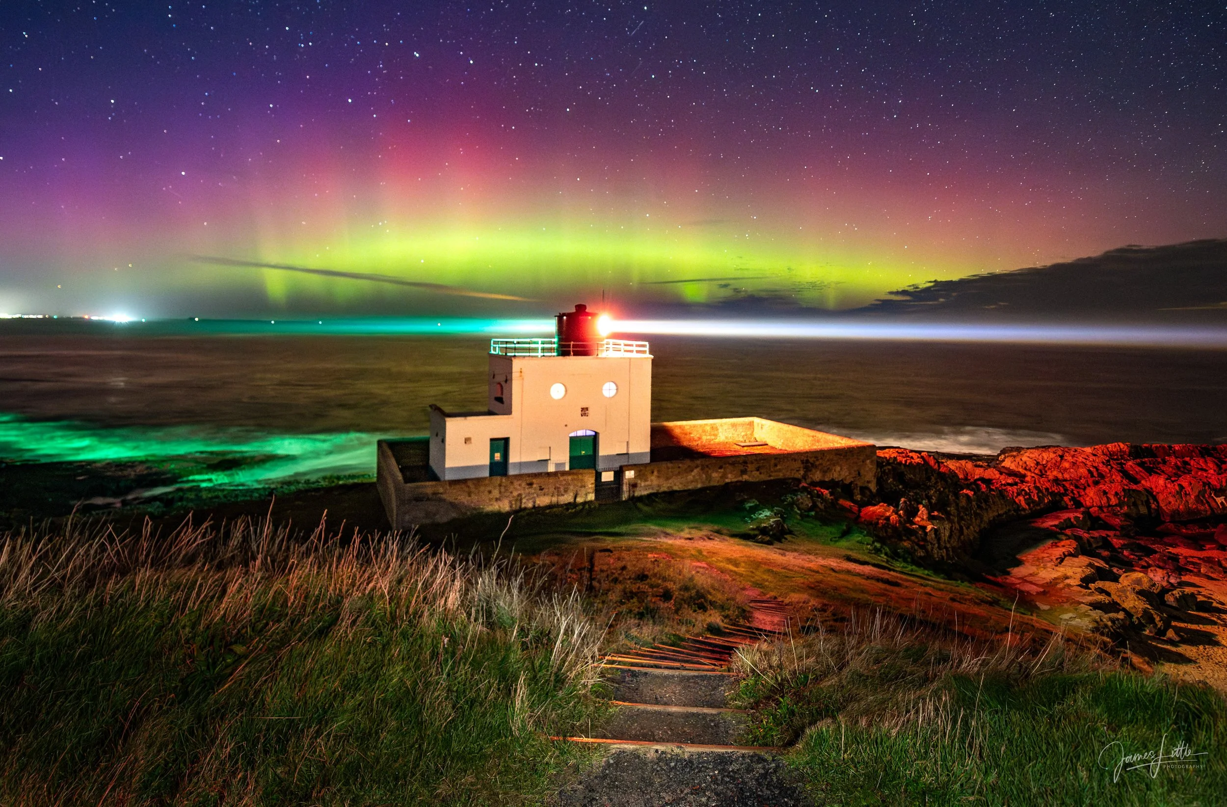 Northern Lights over Bamburgh lighthouse