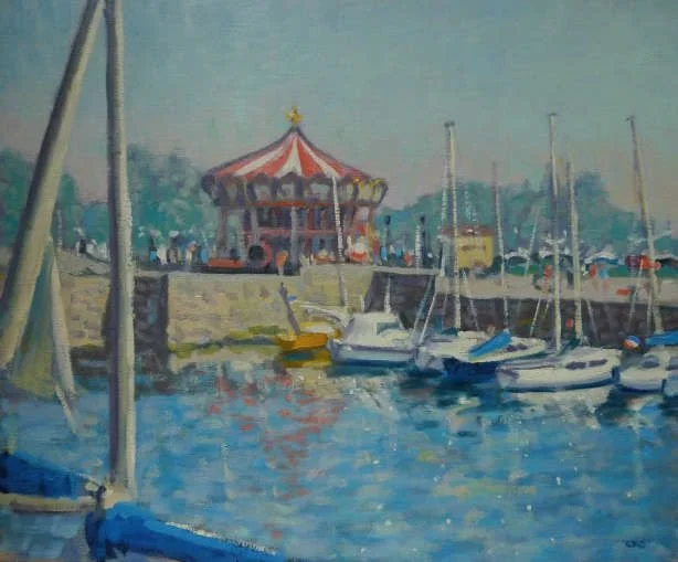 Painting of a marina with sailboats and a carousel on a hill in the background under a clear sky.