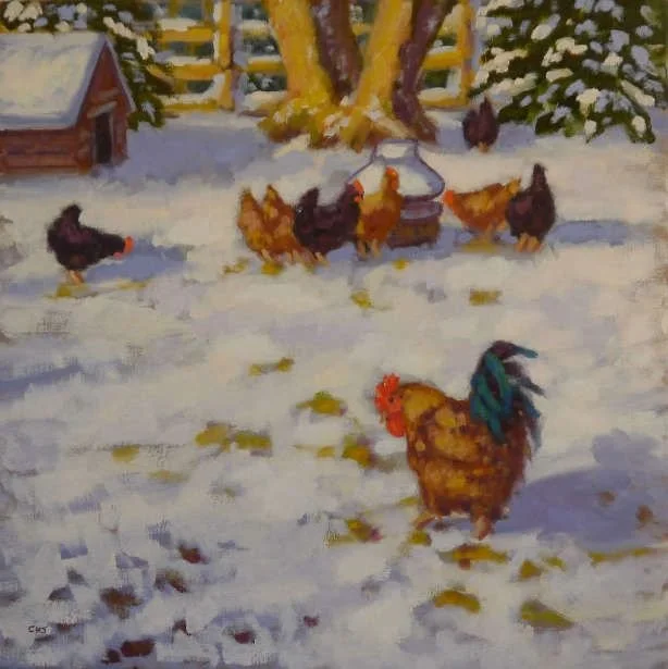 A rooster and six hens in a snow-covered yard near a wooden chicken coop and trees, with footprints in the snow.