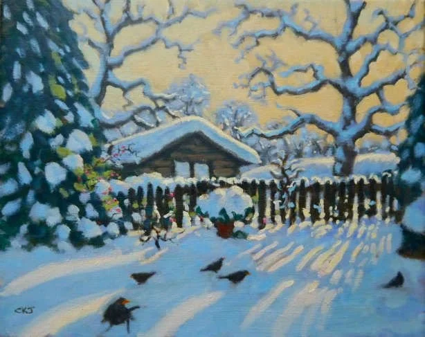 A snowy winter scene with a cozy house, bare snow-covered trees, a snow-covered fence, and birds on the ground under a pale sky.
