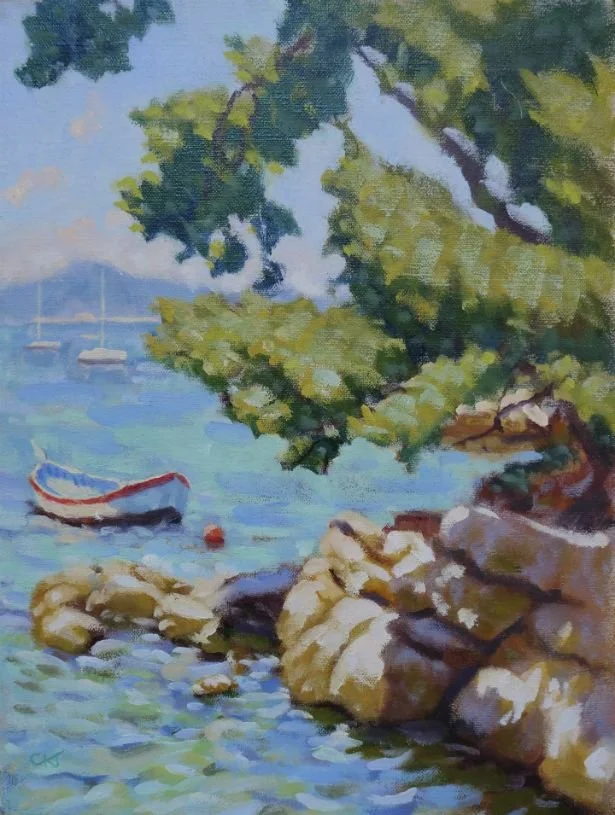 Painting of a peaceful lakeside scene with a boat near rocky shoreline, green trees, and distant sailboats in the water.