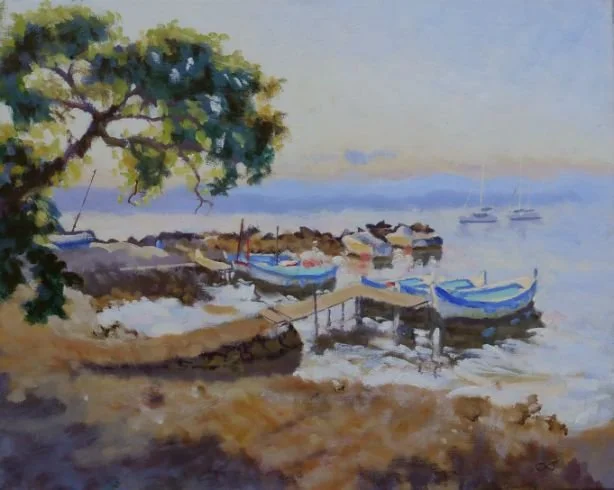 Watercolor painting of a coastal scene with boats docked near a tree with green leaves, calm water, and distant sailboats.