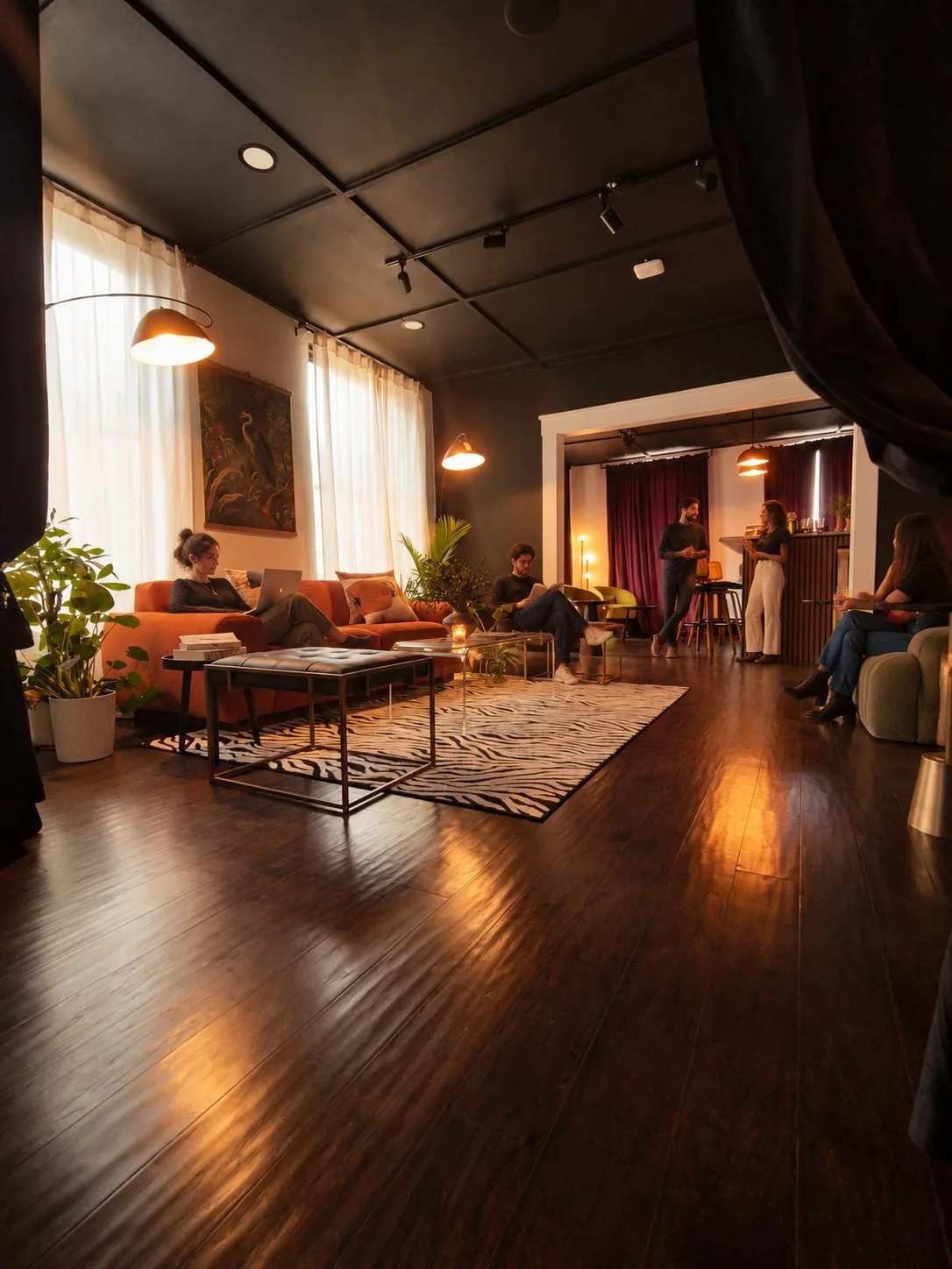 Analog Room lounge with digitally illustrated guests working, reading and socializing