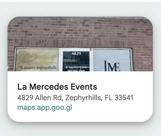 Business sign for La Mercedes Events at 4829 Allen Rd, Zephyrhills, FL with a brick building background.
