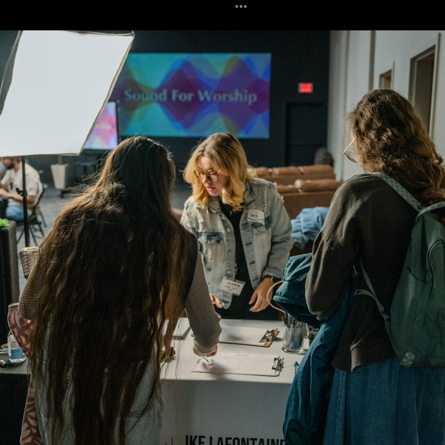 Nora LaFontaine checking in attendees for ILPC’s audio training seminar.