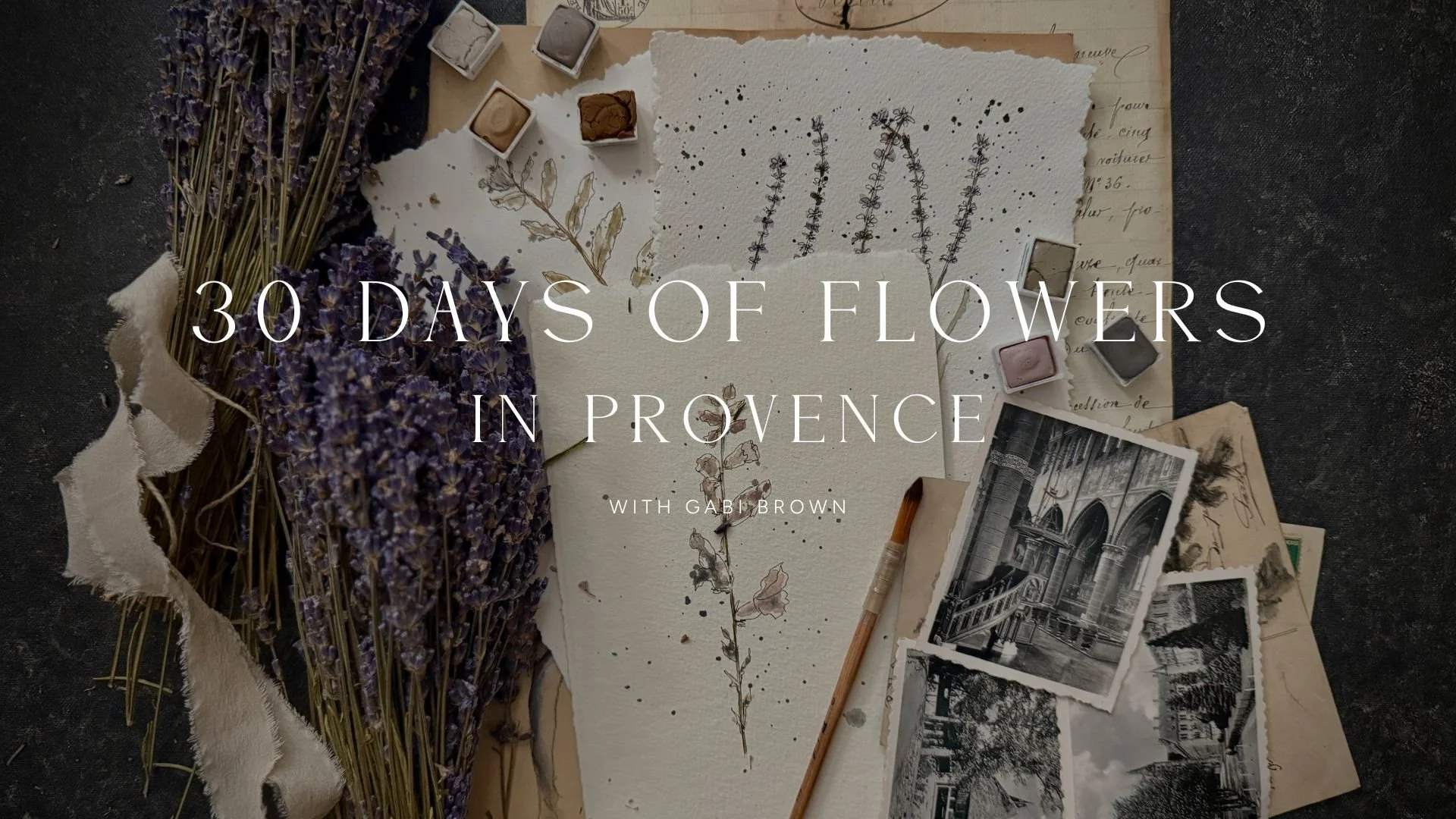 A flat lay photograph of dried lavender, vintage postcards, a blank watercolor paper with botanical sketches, small watercolor pans, and a paintbrush, arranged on a dark textured surface. Overlaid text reads '30 Days of Flowers in Provence with Gabi Brown.'