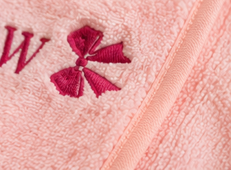 06_youth_towel_wrap_embroidery_detail.png