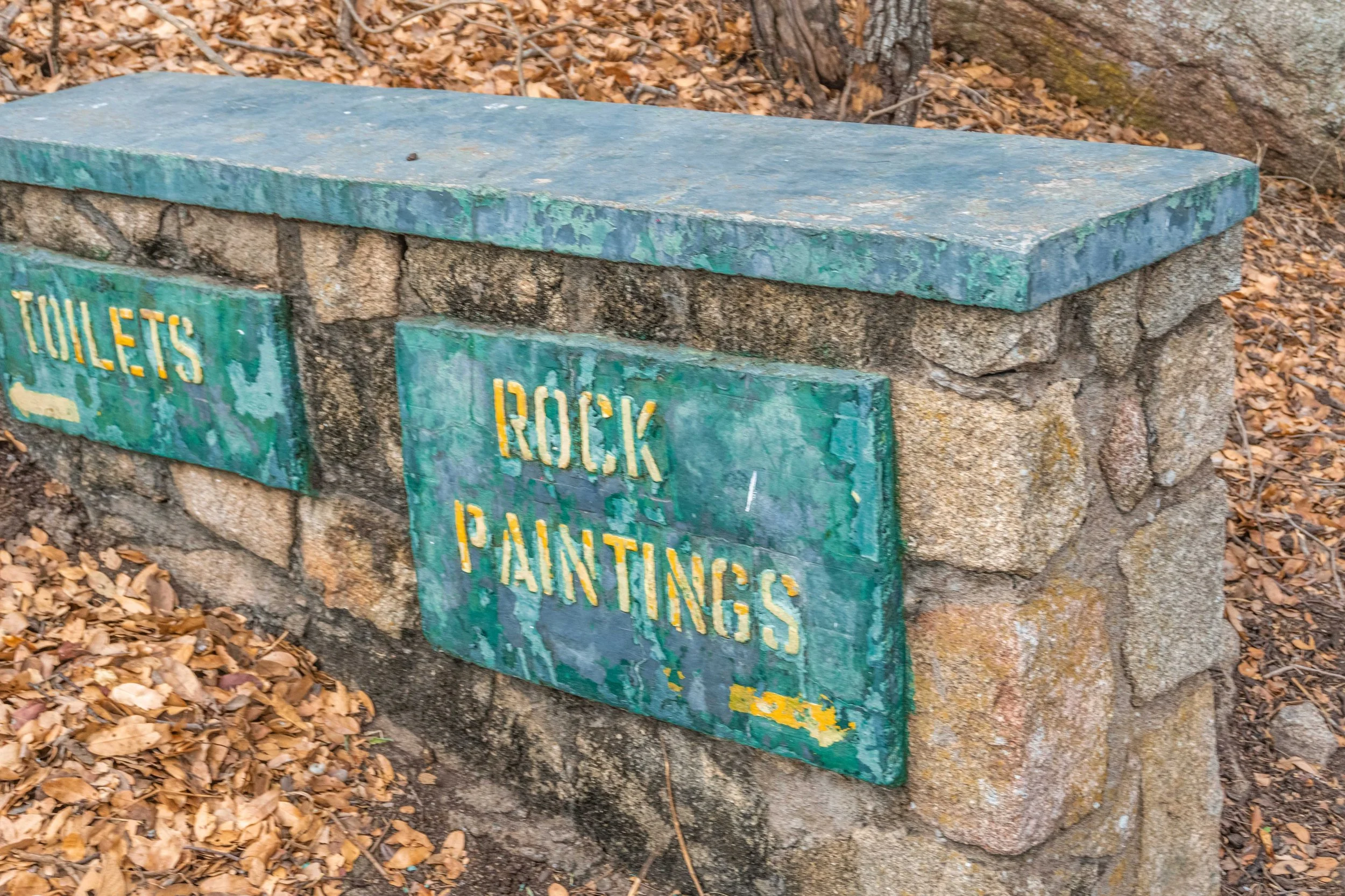 signage showing where the rock paintings are located