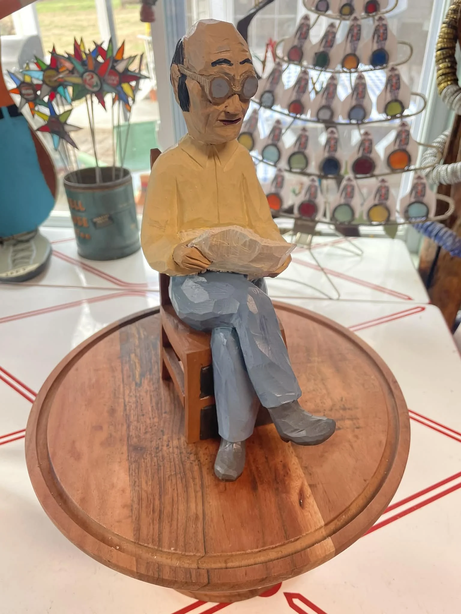 Man sitting with newspaper