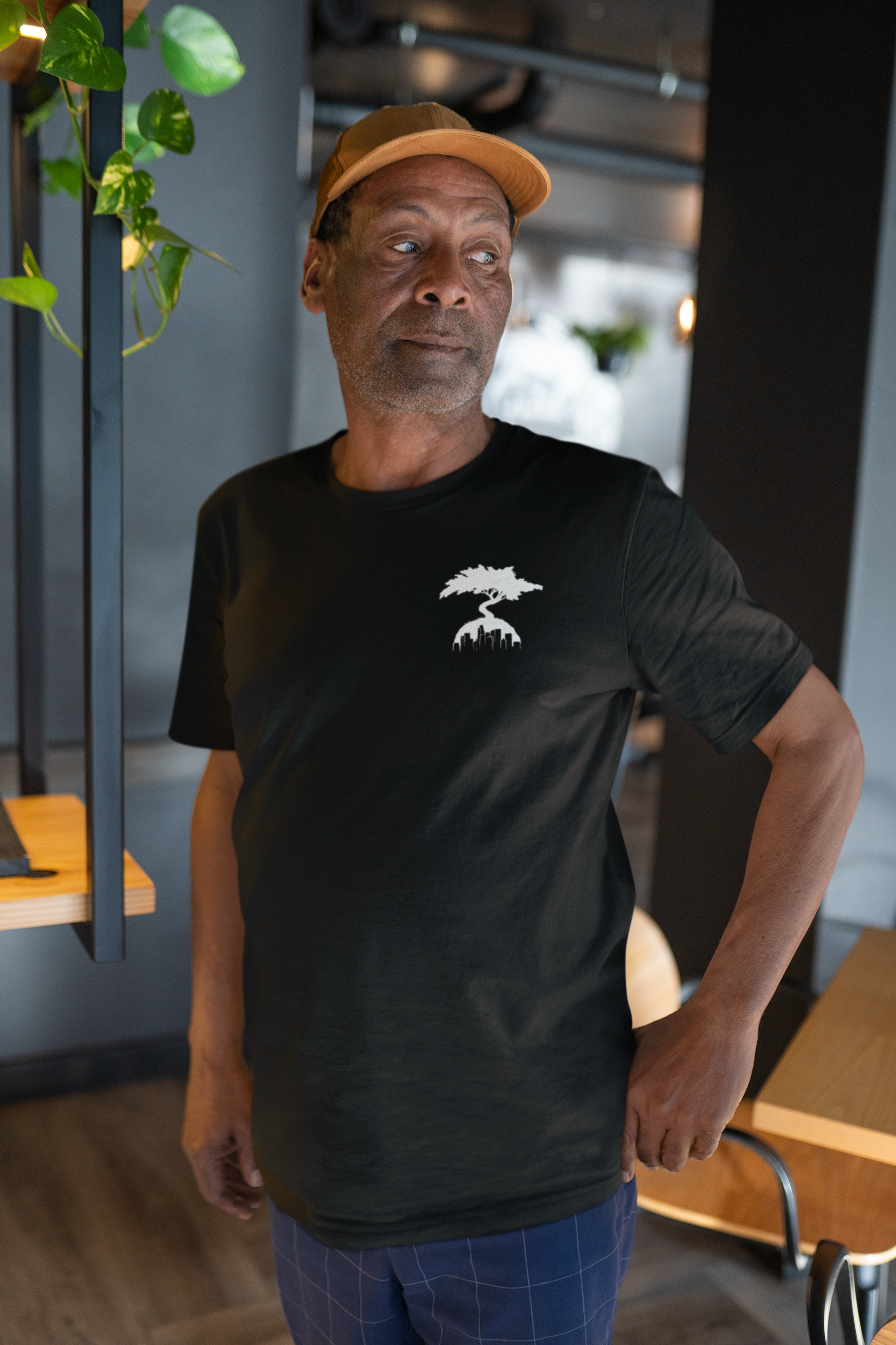 Smog City Standard Logo Tee Front with Man wearing it.webp