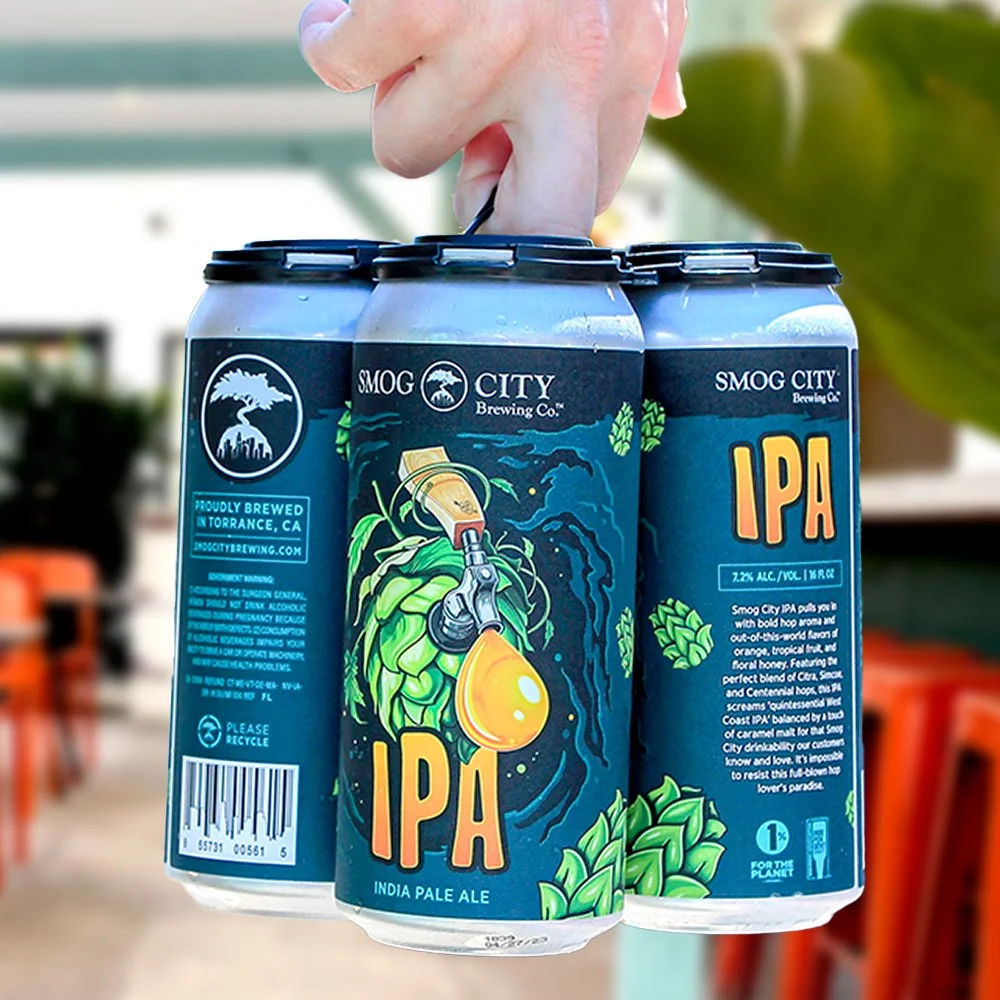 Close-up of hand holding a 4-pack of Smog IPA from Smog City Brewing Co. in Torrance, CA.
