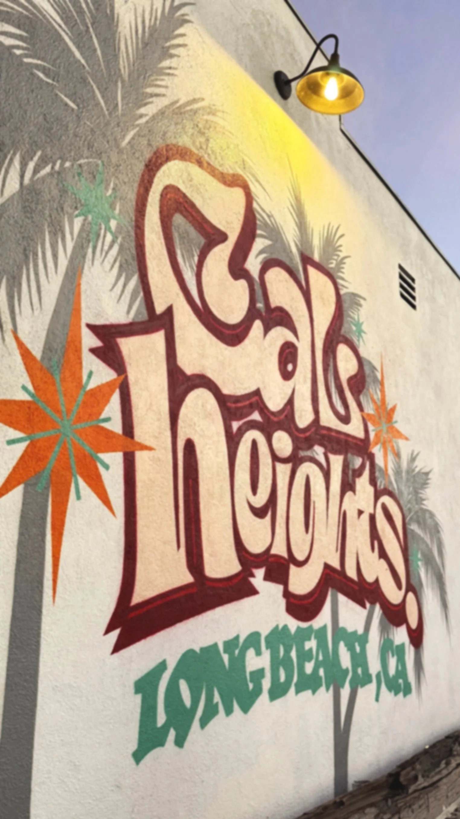 Cal Heights Long Beach mural painted on an outside wall.