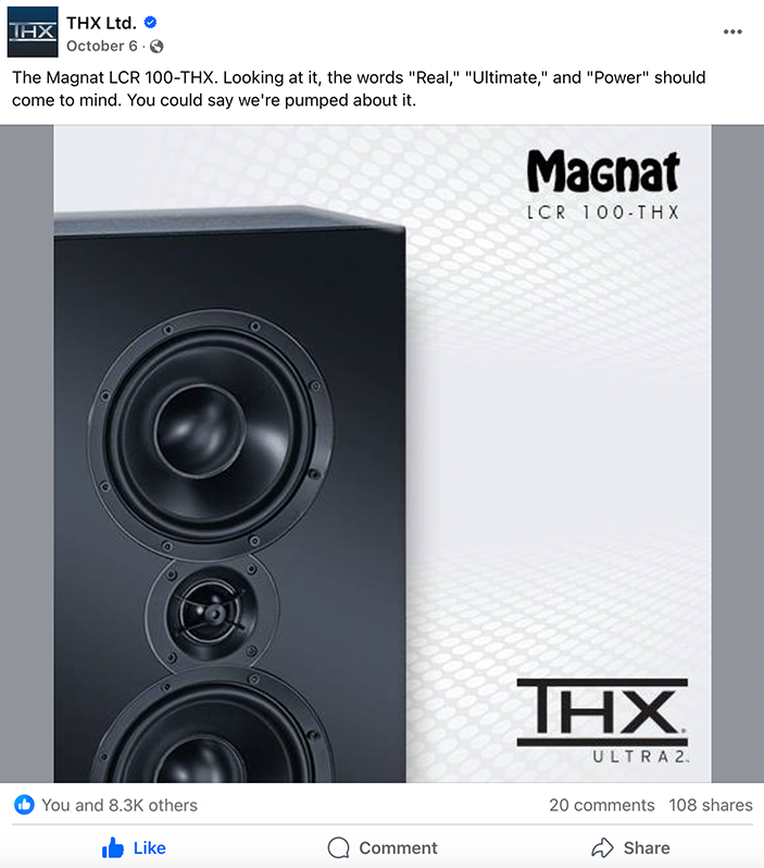 Close-up of a Magnat LCR 100-THX speaker showing three drivers, with a white and gray patterned background, and text indicating it is a THX Ultra 2 speaker.