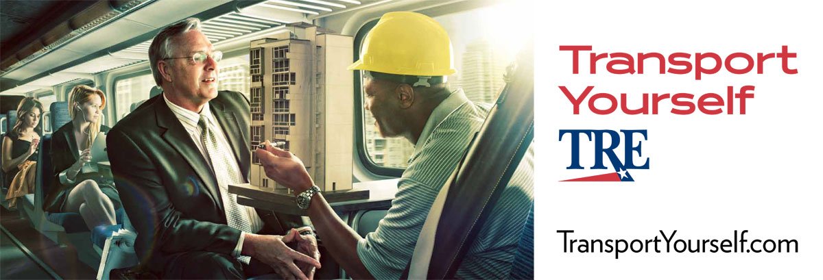 Business professional in a suit and a construction worker with a hard hat shaking hands inside a train, with a cityscape visible through the window, promoting transportation safety and self-driving technology.