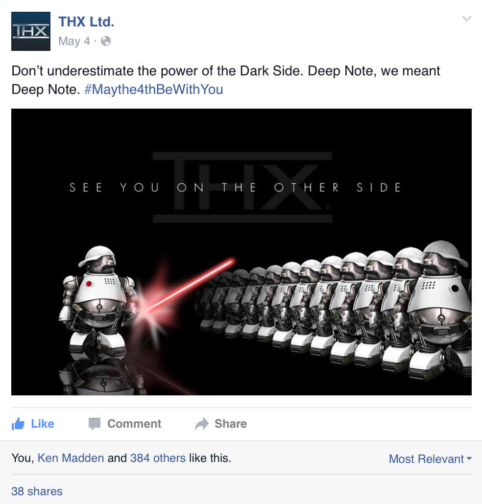 Group of robot-like figures from the game May the 4th be with you, with one robot holding a red laser sword, facing a line of identical robots against a black background and the text "See you on the other side."
